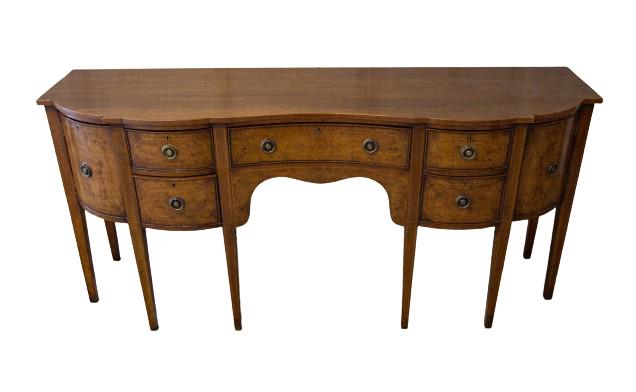 Holland & Co. Double Serpentine Sideboard: Holland & Co. Double Serpentine Sideboard.Measures 35 inches x 75 inches x 22 inches.