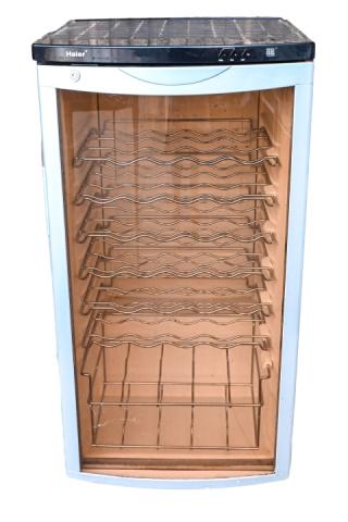 Haier 42-bottle Wine Cooler: Haier 42-bottle Wine Cooler.Measures 38 inches x 19.5 inches x 21 inches.