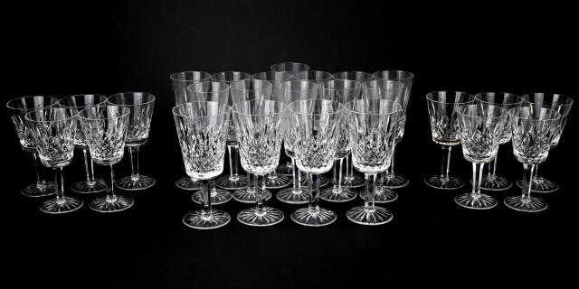 Collection Waterford Stemware: Collection Waterford Stemware, Includes 4 red wine glasses, 10 white wine glasses, 12 champagne glasses. Red wine glass measures 7 inches x 3.25 inches.