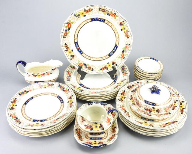 Stoke on Trent Service w Hand Painted Floral Motif: Corona Ware Hancock & Sons Stoke on Trent "Nancy" Service with Hand Painted Floral Detail. Includes 6 dinner plates, 10 salad plates, 2 gravy boats, creamer, and covered butter dish. Dinner plates mea