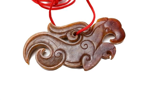 Qing Archaism of a Han Dynasty Dragon Pendant: 19th Century Qing archaism of a Han Dynasty Dragon Pendant.