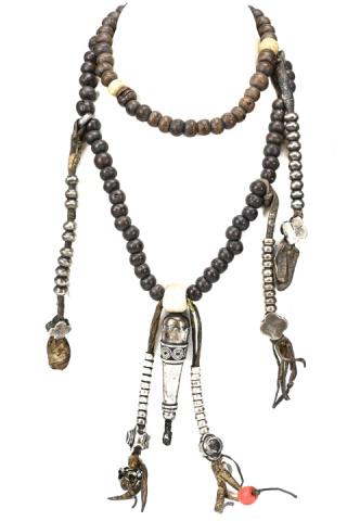 Tibetan Medicine Mala Healing Necklace: Tibetan Medicine Mala Healing Necklace with Coral, Bone and Carved Beads with Silver Tone Beaded and Pendant Accents. Purchased by the collector in the 1970's. Measures approximately 32 inches long wi