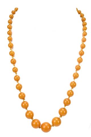 Amber Choker Necklace w Graduated Beads: Amber Choker Necklace w Graduated Beads. Largest bead measures .5 inches in diameter. Necklace measures 19 inches long.
