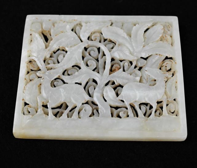 Yuan Dynasty Reticulated Belt Plaque / Applique: Yuan Dynasty Reticulated Belt Plaque / Applique. The jade has frame, rust spot on the reverse probably from attachment to the belt. 2.5 inches x 3 inches.