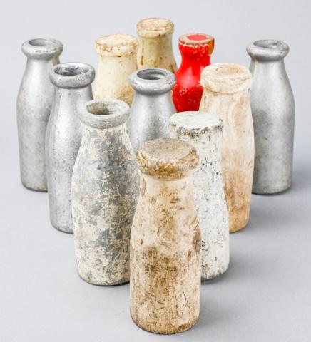 Antique Wood & Metal Carnival Game Bottles: Collection of Antique Wood & Metal Painted Carnival Amusement Park Game Bottles. Approximately 8 inches tall.