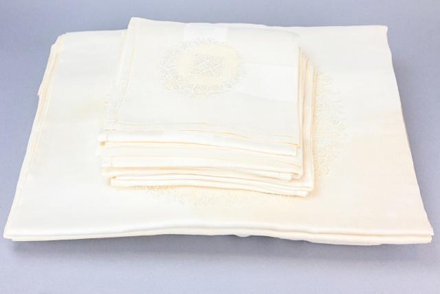 2 Vintage Belgian Lace Tablecloths & Napkins: 2 Vintage Belgian Lace Embroidered Custom Made Tablecloths with Monograms and Matching Napkins. Some color fading or staining. Dining table size.