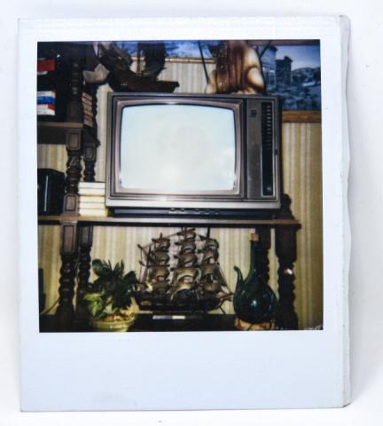 Andy Warhol Polaroid - Estate of Andy Warhol: Andy Warhol Polaroid - Estate of Andy Warhol. Polaroid by Andy Warhol. Stamped and authenticated from The Estate of Andy Warhol on backside. Measures 4.25 inches x 3 3/8 inches.