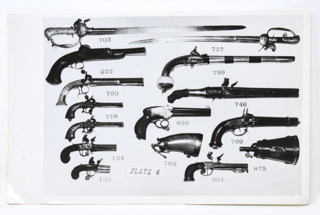 Andy Warhol Black & White Photograph of Guns: Andy Warhol Black & White Photograph of Guns. Black and white photograph of guns by Andy Warhol. Embossed with the artists' name in the lower right and stamped "Authenticated by The Estate of Andy War