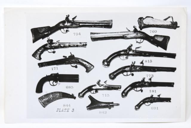 Andy Warhol Black & White Photograph of Guns: Andy Warhol Black & White Photograph of Guns. Black and white photograph of guns by Andy Warhol. Embossed with the artists' name in the lower right and stamped "Authenticated by The Estate of Andy War
