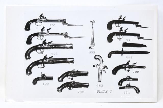 Andy Warhol Black & White Photograph of Guns: Andy Warhol Black & White Photograph of Guns. Black and white photograph of guns by Andy Warhol. Embossed with the artists' name in the lower right and stamped "Authenticated by The Estate of Andy War