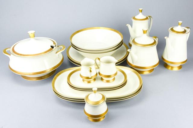 18 Vohenstrass Bavaria Porcelain Serving Pieces: 18 J. Seltmann Vohenstrass Bavaria Porcelain Serving Pieces. 18 pieces total. Ivory porcelain and gold leaf trimmed serving pieces includes covered tureen, coffee pot, 2 tea pots, 3 serving bowls, 3 l