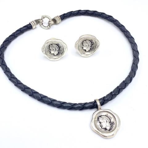 Vintage Leslie Block Sterling Coin Necklace: Vintage Leslie Block Sterling Coin Necklace – In the style of ancient coin jewelry this vintage set is from the 1980s. All the silver “coins” are stamped sterling and Leslie Block. Pendant hangs