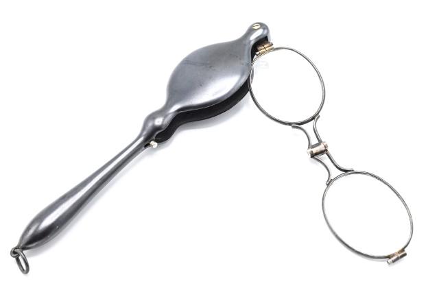 Antique 19th C Gun Metal Lorgnette Eye Glasses: Antique 19th C Gun Metal Lorgnette Eye Glasses w Ring at End for Chain or Chatelaine. Measures 5.75 inches in length.