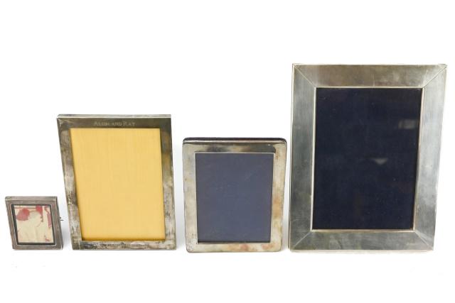 4 Vintage Sterling Silver Picture Frames: 4 Vintage Sterling Silver Picture Frames. Largest frame measures 9 inches x 7 inches. Small frame is by Asprey.