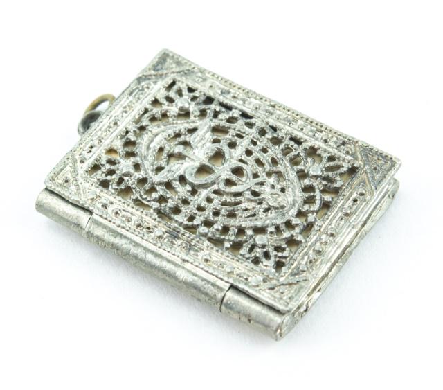 Antique Filigree Locket w Staff of Hermes Caduceus: Antique Filigree Locket w Staff of Hermes Caduceus Design. Measures just over 1.25 inches in length
