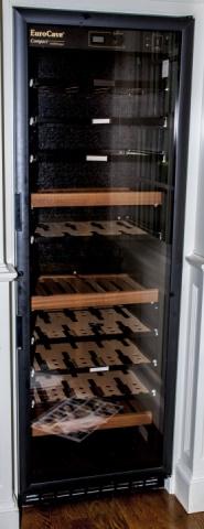 EuroCave Compact Refrigerated Wine Celler: EuroCave Compact Refrigerated Wine Cellar. Glass door, black. Category 61-160 bottles. 70 inches x 23 inches x 17 inches