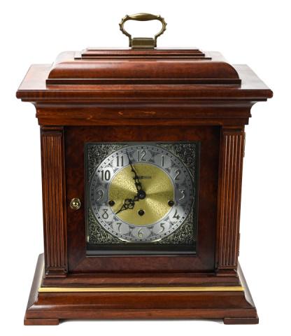 Howard Miller 2 Jewel 1050-020 Case Mantel Clock: Howard Miller 2 Jewel 1050-020 Case Chiming Mantel Clock with Mirrored Back. 20 inches x 14 inches x 8 inches.