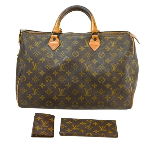 Licensed 1970s Louis Vuitton Logo Roll Bag (1 of 11)