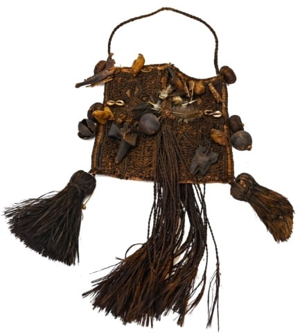 Papua New Guinea Decorated Bilum String Bag: Papua New Guinea Decorated Bilum String Bag. Approximately 16 inches x 12 inches.
