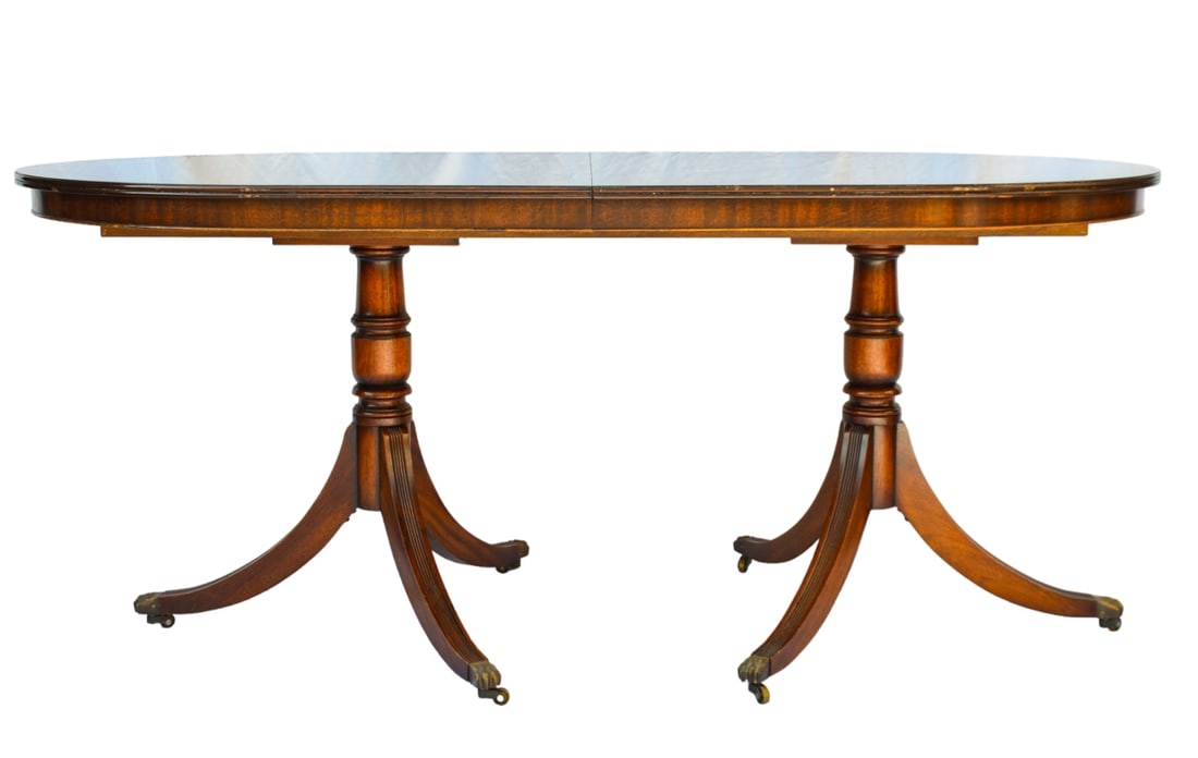 Bevan Funnell Reegency Style Pedestal Dining Table: Bevan Funnell Regency Style Mahogany Double Pedestal Dining Table with One Leaf.Measures 30 inches x 70 inches x 35 inches, leaf measures 16 inches.
