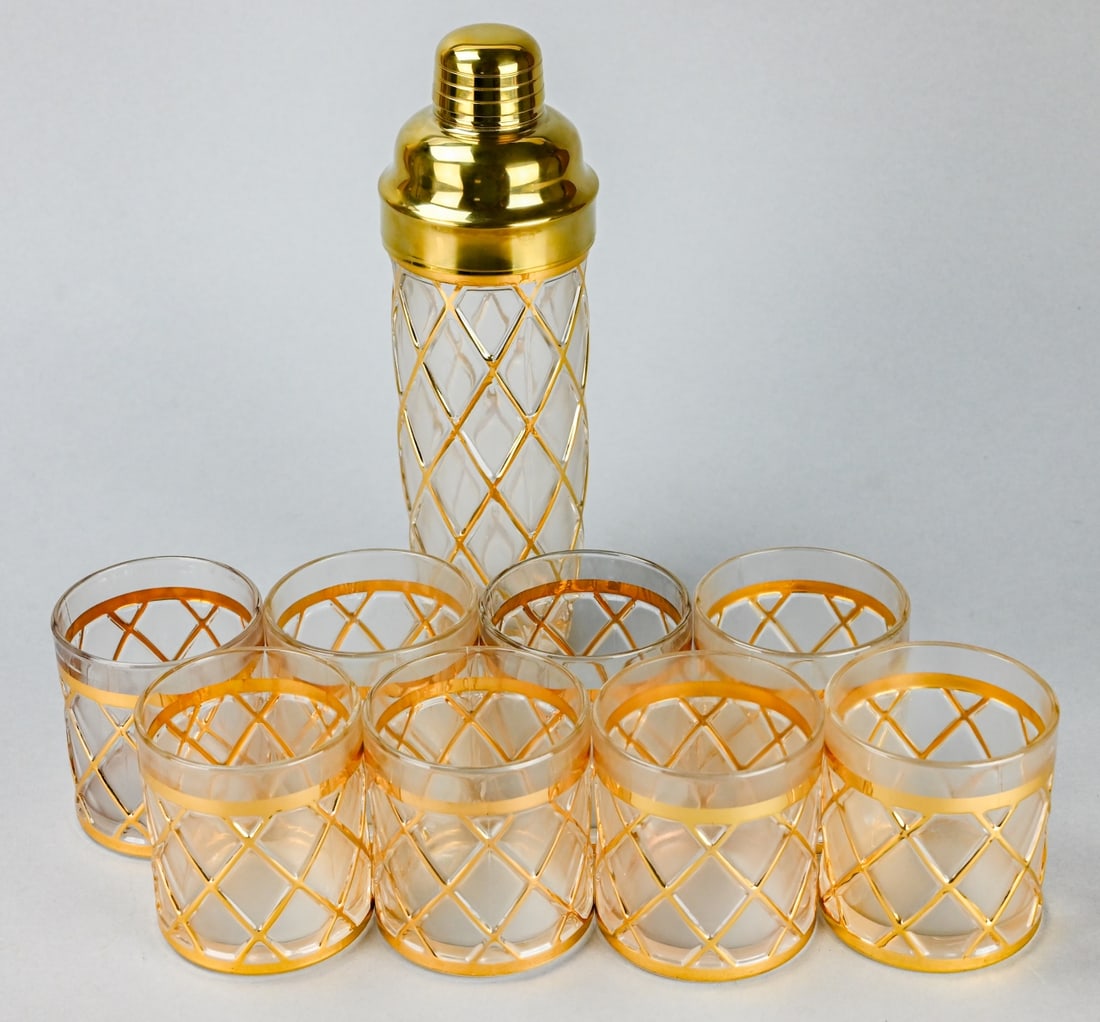 8 Altuzarra 18k Gold Cocktail Glasses and Shaker: 8 Altuzarra 18k Gold Cocktail Double Old Fashion Glasses and a Shaker.Shaker measures 11 inches x 3 inches diameter.