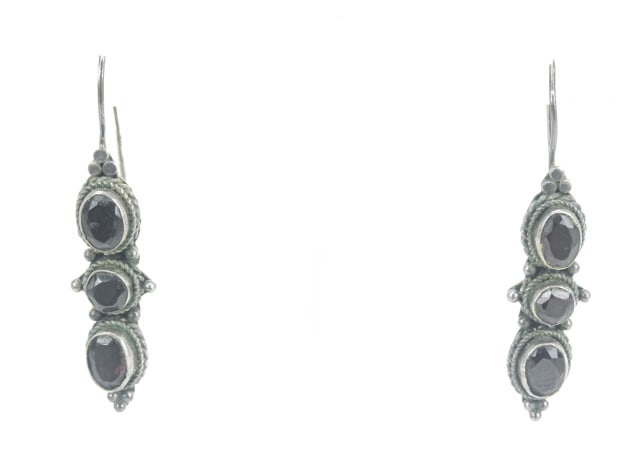 Pair of Sterling Silver Bezel Set Garnet Earrings: Pair of Sterling Silver Bezel Set Garnet Earrings. Each measures 1.75 inches in length.