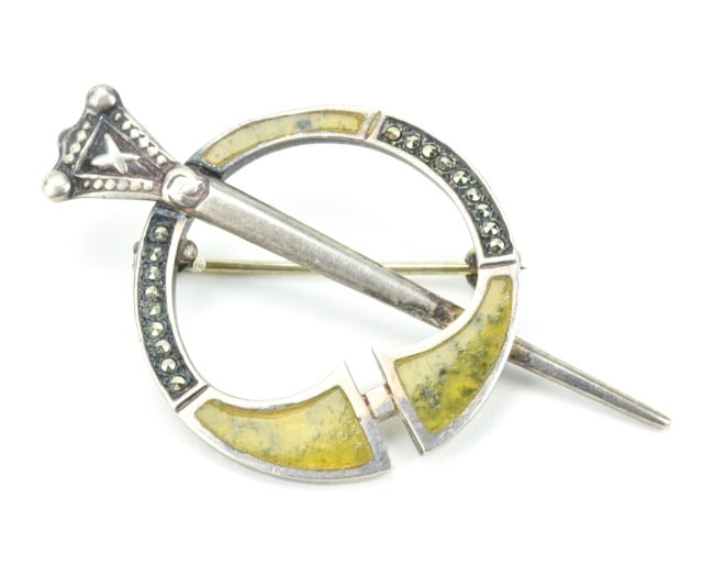 Sterling & Connemara Marble Brooch w Marcasite: Vintage Sterling Silver & Connemara Marble Brooch w Marcasite. Measures 2 inches in length.