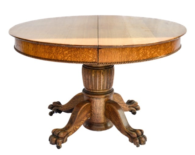 Antique Round Carved Claw Foot Dining Table: Antique Round Hand Carved Oak Claw Foot Extension Dining Table and Two Leaves.Measures 29.5 inches x 45.75 inches diameter, leaves measures 10.25 inches each.