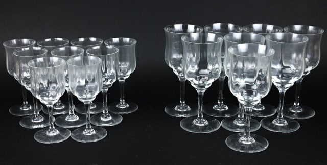 17 Baccarat Capri Optic Red & White Wine Glasses: 17 Baccarat Capri Optic Red & White Stem Wine Glasses. Larger glass measures 7 inches x 3.25 inches, smaller glass measures 6 inches x 2.5 inches.