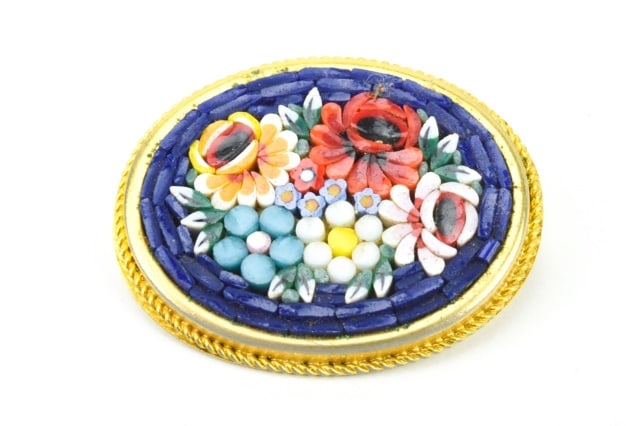 Vintage Italian Floral Micro Mosaic Oval Brooch: Vintage Italian Floral Micro Mosaic Oval Brooch in Gilt Metal. Measures just over 1.5 inches in length.