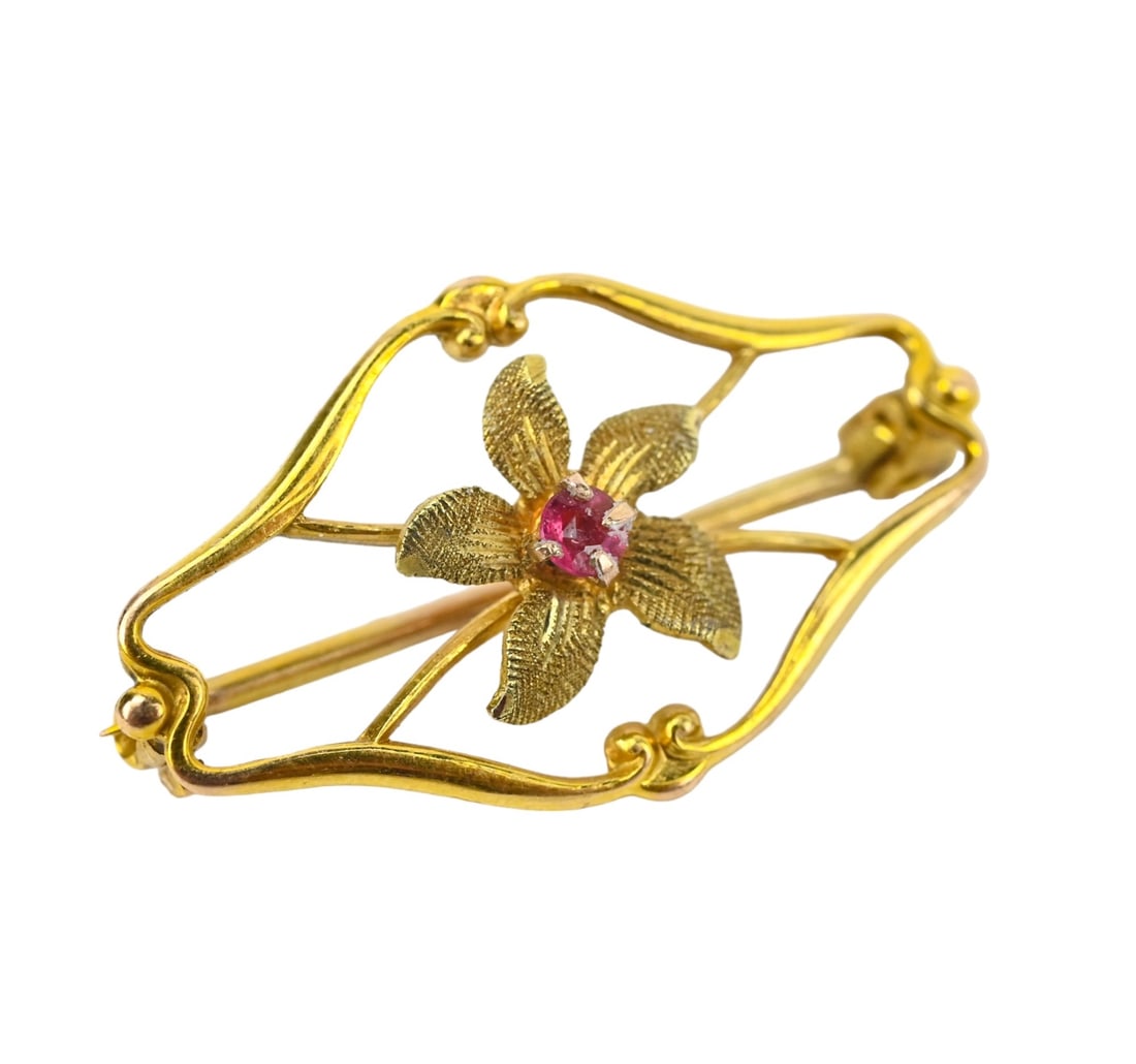 14K Gold and Ruby Antique Edwardian Pin: 14K Gold and Ruby Antique Edwardian Pin Measuring 1 Inch in Length. Gold karat and Stone carat weights are for estimating purposes, jewelry does not qualify for refunds.
