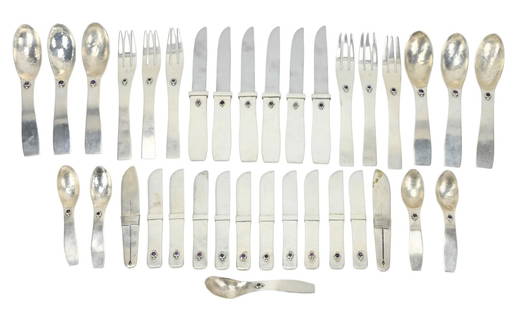 William Spratling Sterling & Amethyst Flatware Set: William Spratling Signed Custom Made Sterling Silver & Amethyst Flatware Service for 6 That is Set with Amethysts, Circa 1945. Pieces could be considered oversized, spoon bowls are hammered, Knives ar