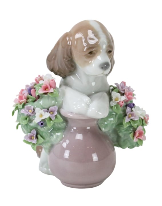 Lladro "Take Me Home" Dog Porcelain Figurine: Lladro "Take Me Home" Dog Porcelain Figurine.Measures 4 inches x 4 inches x 3 inches.