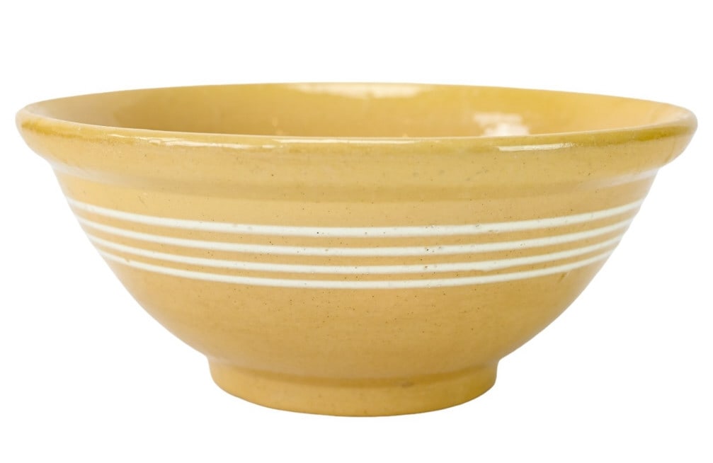 Vintage Yellow Ware Stone Ware Bowl: Vintage Yellow Ware Stone Ware Bowl. Measures 4 inches x 10 inches in diameter.
