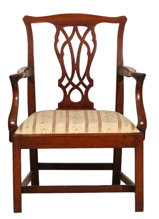 Chippendale Mahogany Carved Upholstered Arm Chair: Chippendale Mahogany Carved Upholstered Arm Chair. Measures 37 inches x 24 inches x 20 inches, measures 18 inches from floor to seat.