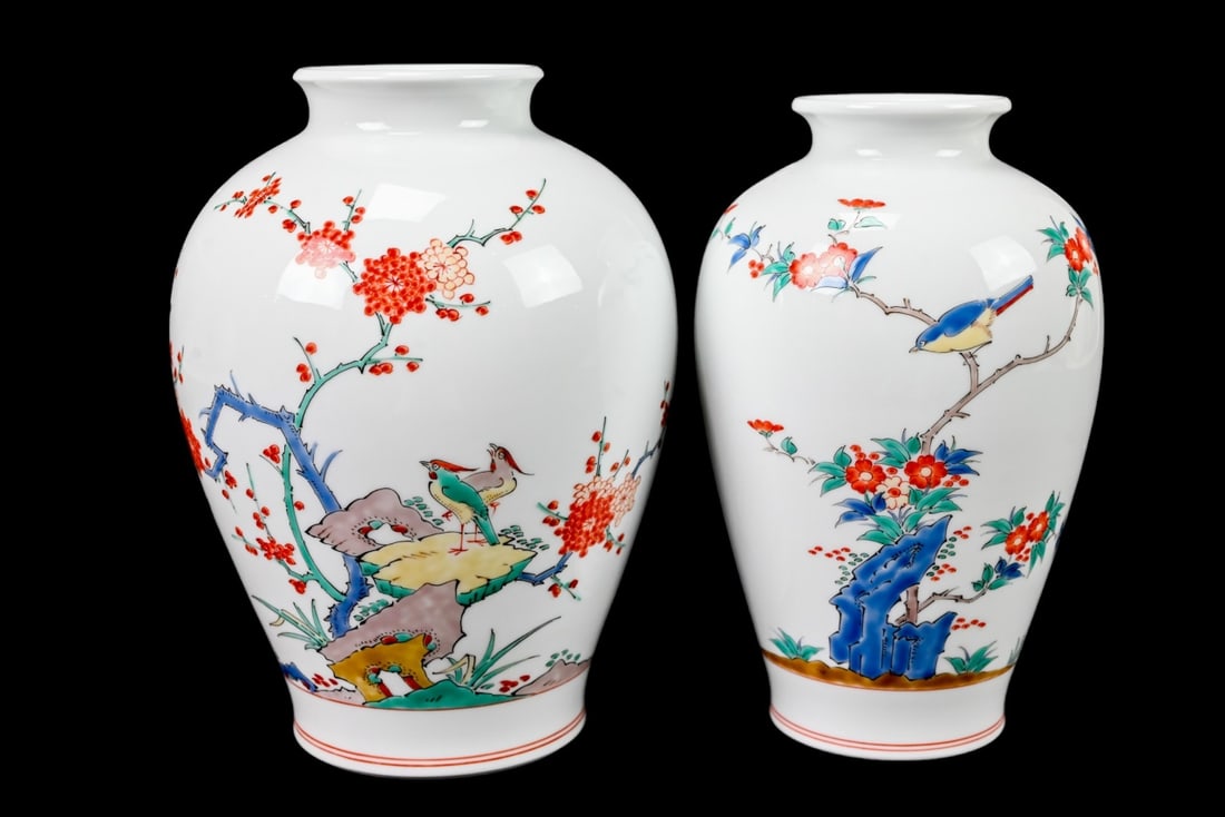 Pair Japanese Hand Painted Porcelain Vases: Pair Japanese Hand Painted Porcelain Vases. larger measures 10 inches x 7 inches in diameter.