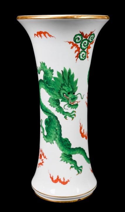 Meissen Hand Painted Dragon w Gold Trim Vase: Meissen Hand Painted Dragon with Gold Trim Vase.Two tiny chipped on the base.Measures 9.75 inches x 4.75 inches diameter.