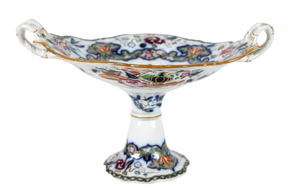 Antique Minton Stem Centerpiece Imari Ware: Antique Minton Stem Centerpiece Imari Ware with 2 Handles. Measures 8 inches x 14 inches. 2 minor chips to underside. Sold as is.