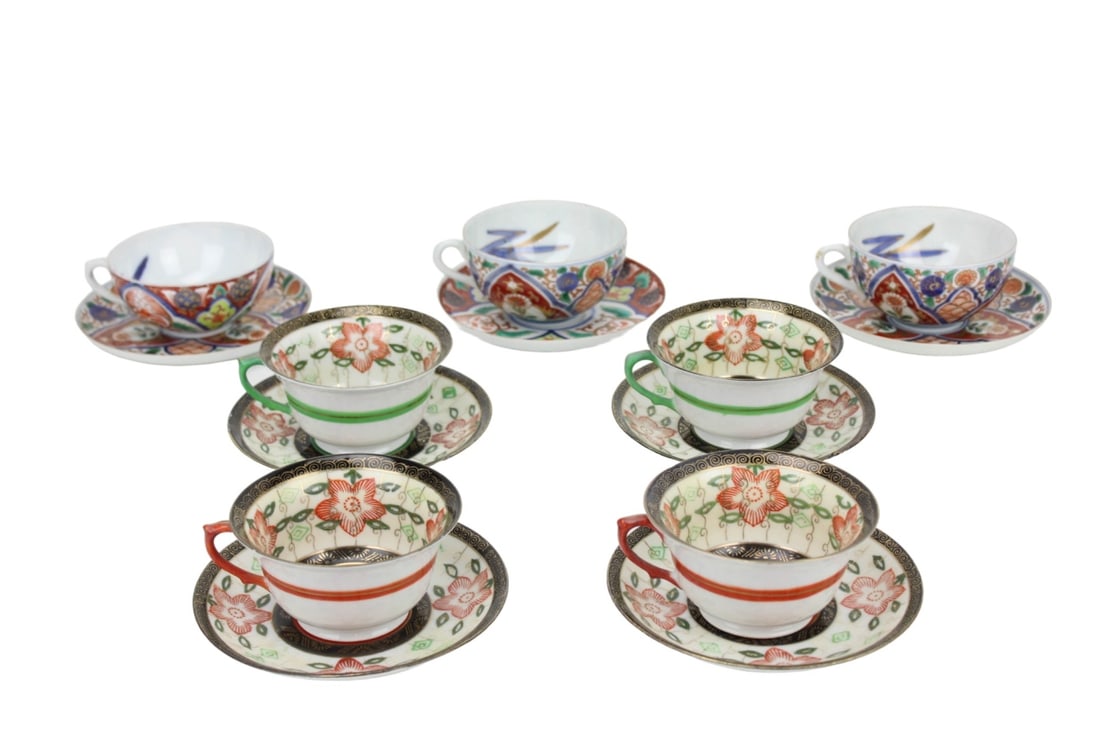 Collection Antique Japanese Porcelain Tea Cups: Collection Antique Japanese Porcelain Tea Cups and Saucers in Mixed Imari Patterns. Measure approximately 3 inches x 4 inches in diameter.