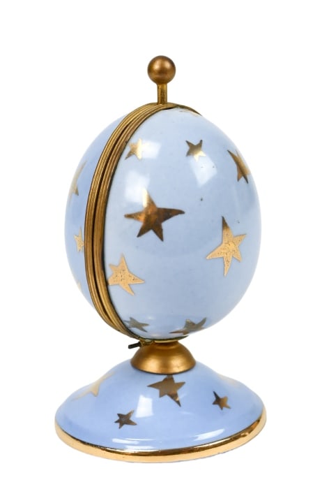 Antique Limoges Egg Form Perfume Casket: Antique Limoges Egg Form Perfume Casket. Opening mechanism is operable. Measures 6 inches x 3 inches.