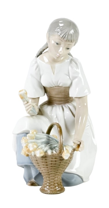 Lladro Nao Porcelain Figurine Girl Picking Flowers: Lladro Nao Porcelain Figurine Girl Picking Flowers. Measures 10 inches x 8 inches.
