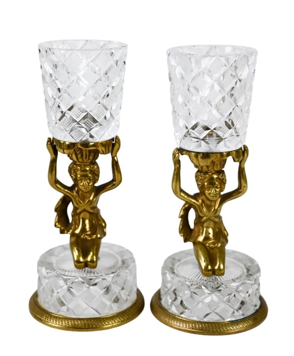 Brilliant Cut Glass & Ormolu Putti Votive Holders: Pair Brilliant Cut Glass & Gilt Ormolu Putti Votive Candle Holders. Each measures 7 inches x 3 inches.