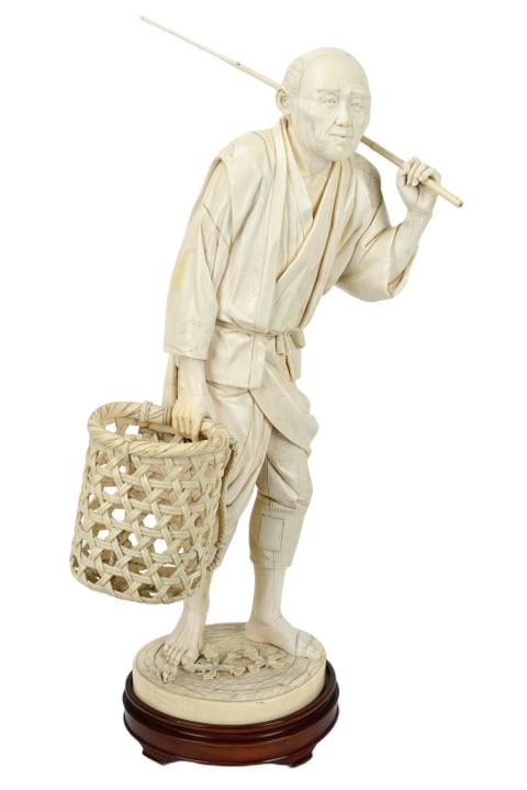 Japanese Carved Bone Figure of A Fisherman: Majestic Japanese Carved Bone Figure of A FishermanRoughly measures 19 inches x 9 inches x 6 inches.Appraisal report is available upon request.