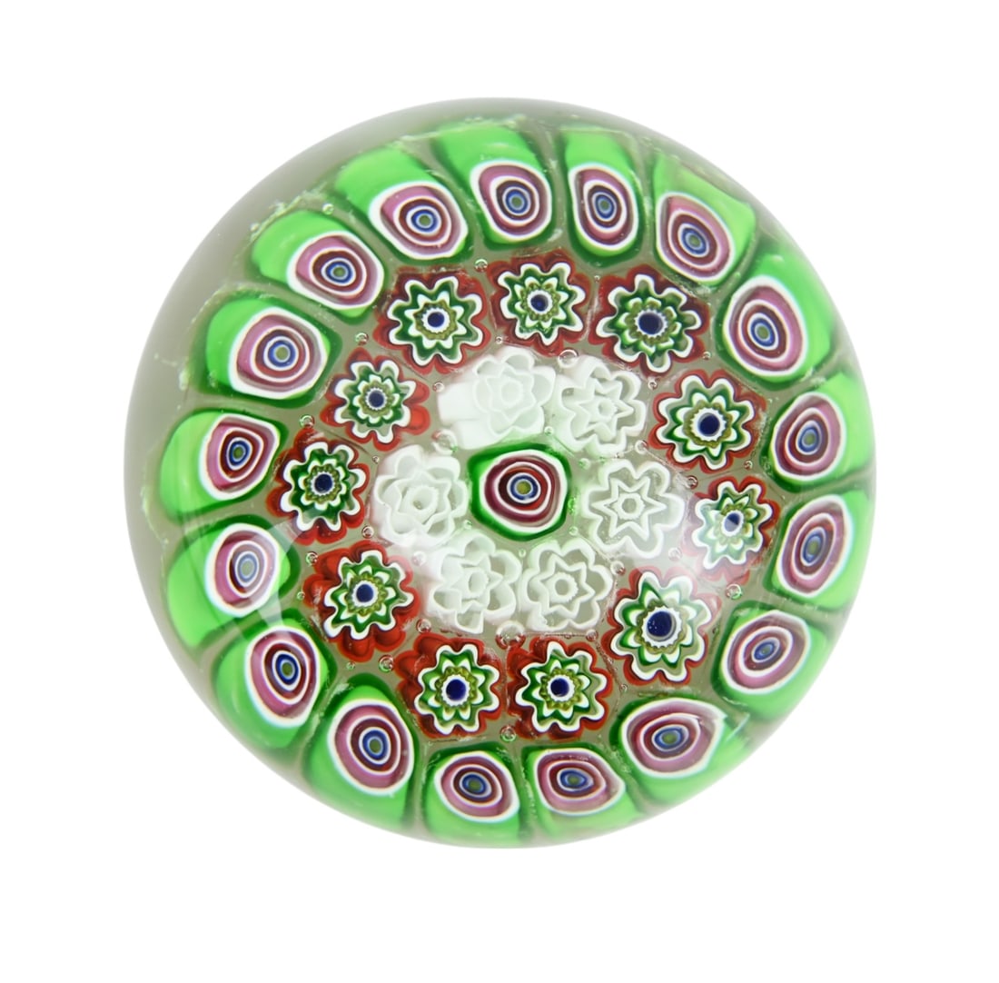 French Art Glass Caned Millefiori Paperweight: French Art Glass Caned Millefiori Paperweight. Measures 3 inches in diameter. (125)