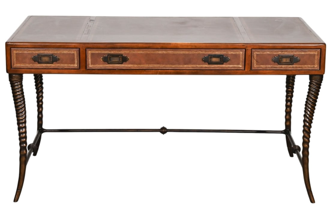 Ernest Hemmingway Thomasville Leather Top Desk: Ernest Hemmingway Thomasville Leather Top Desk / Writing Table with Twisted Metal Legs.Measures 30 inches x 56 inches x 22 inches.