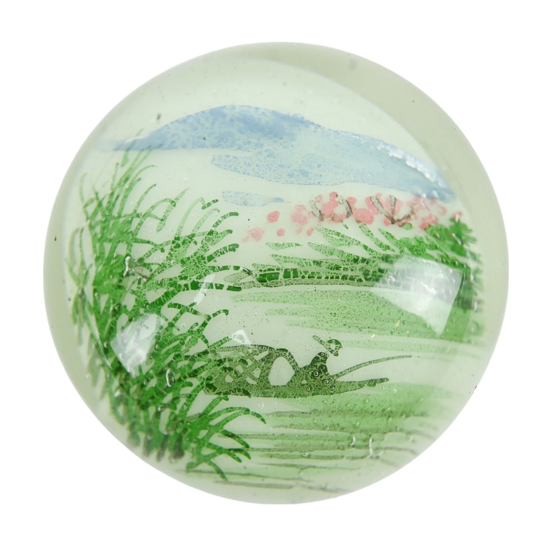 Antique Chinese White Ground Art Glass Paperweight: Antique Chinese White Ground Art Glass Paperweight with Fisherman Motif. Some scratching to surface. Measures 2.5 inches in diameter. (33)