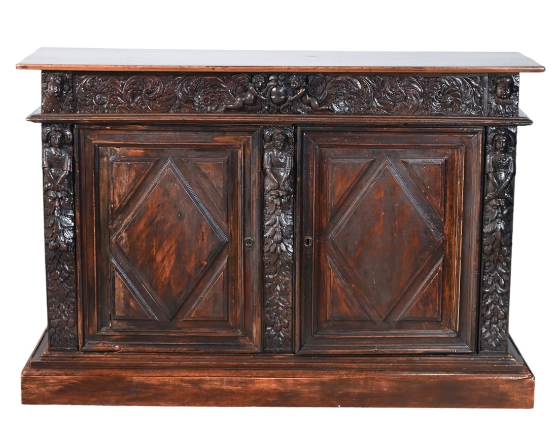 Antique Renaissance Revival Carved Sideboard: Antique Renaissance Revival Carved Sideboard.Measures 44 inches x 66 inches x 19 inches.
