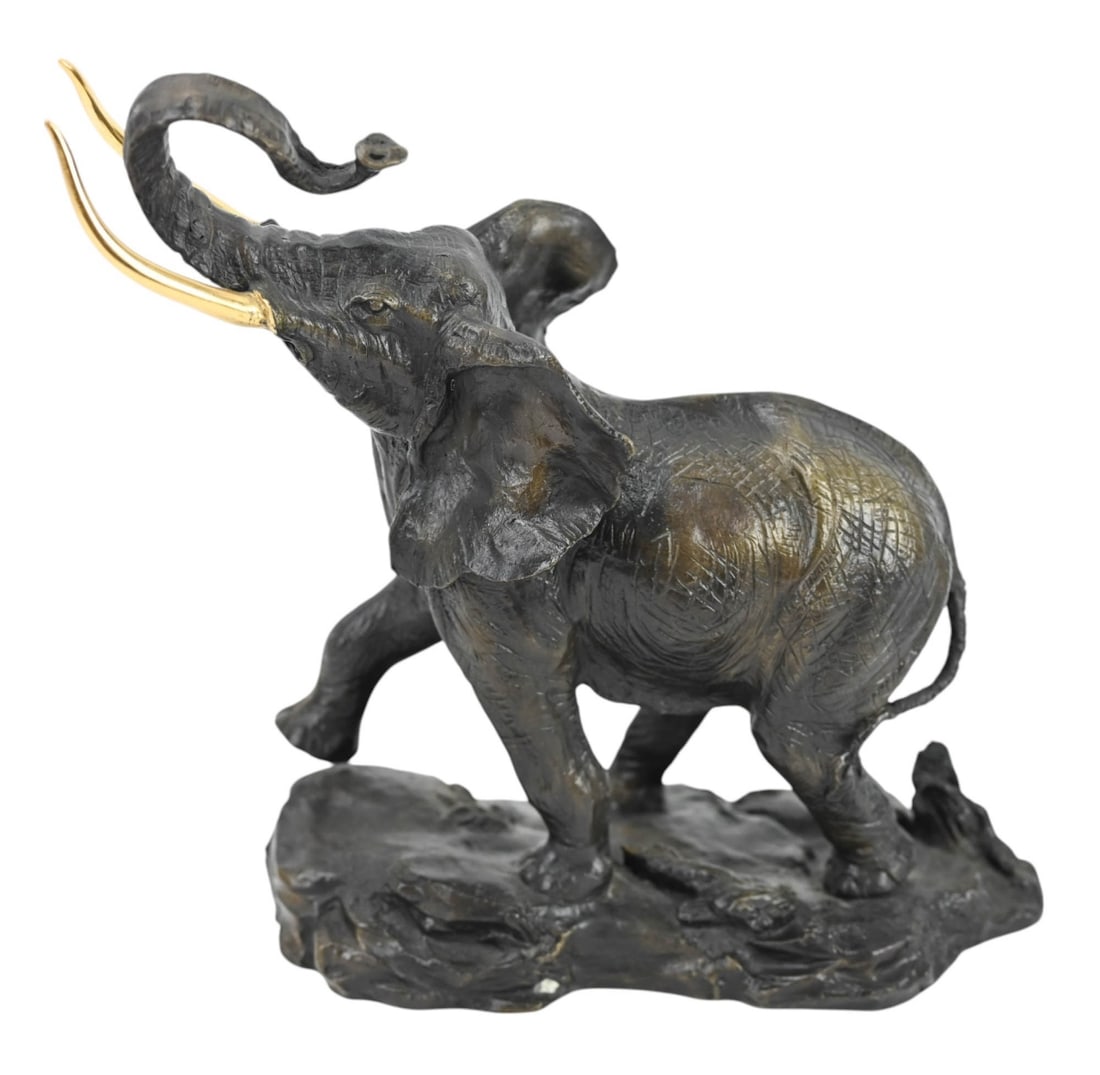 Franklin Mint Bronze Tone Elephant Table Statue: Franklin Mint Bronze Tone Elephant Table Statue Titled African Wildlife Foundation Dated 1991. Measures 10 inches x 9 inches.