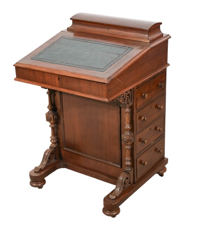 Antique English Leather Top Davenport Desk: Antique English Embossed Leather Top Davenport Desk. Visible cracks and wear to surface. Sold as is.Measures 33 inches x 22 inches x 21 inches.