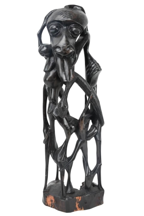 African Ebony Hand Carved Tree of Life Statue: African Ebony Hand Carved Tree of Life Statue. Measures 22 inches x 8 inches.